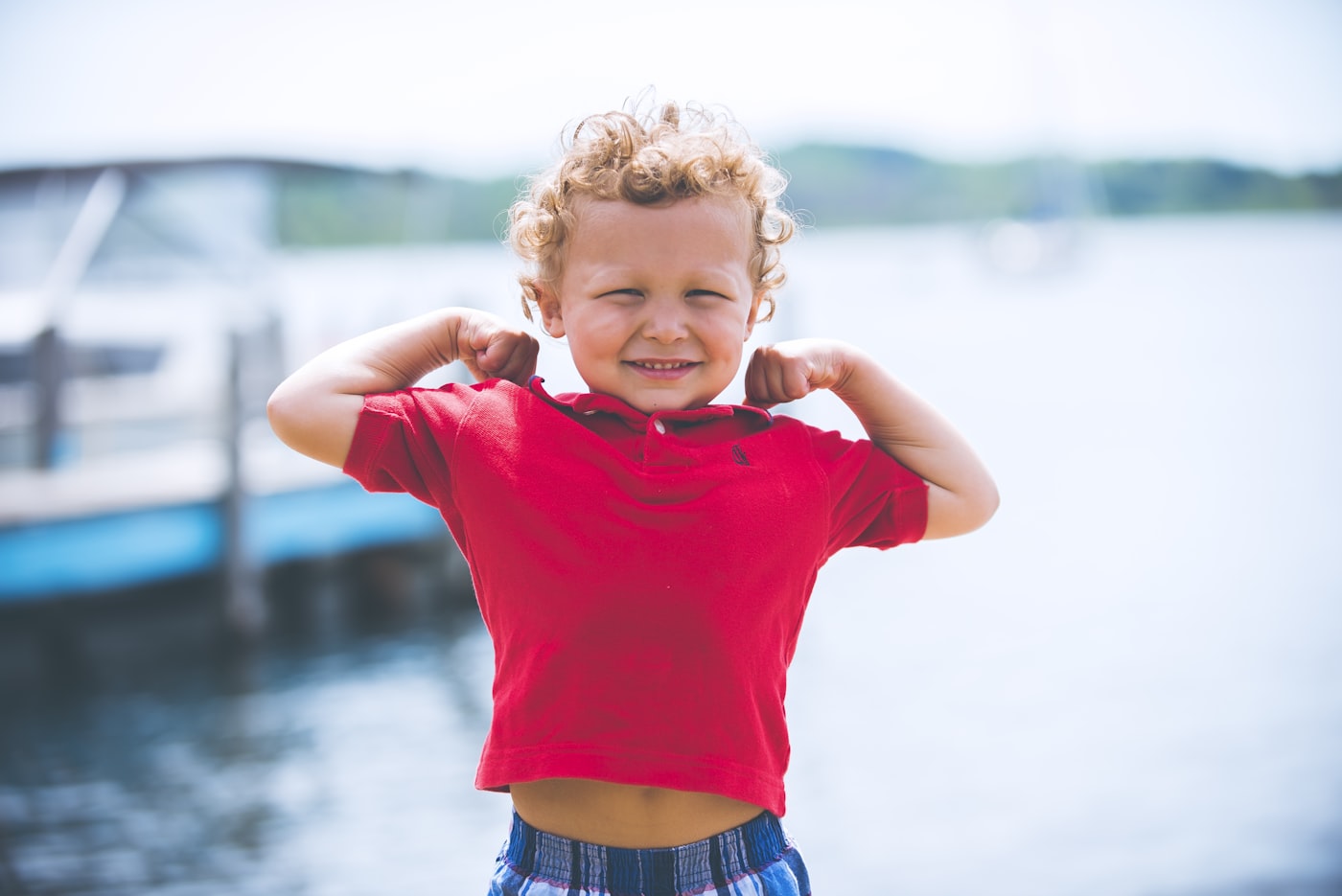 A smiling child outdoors
